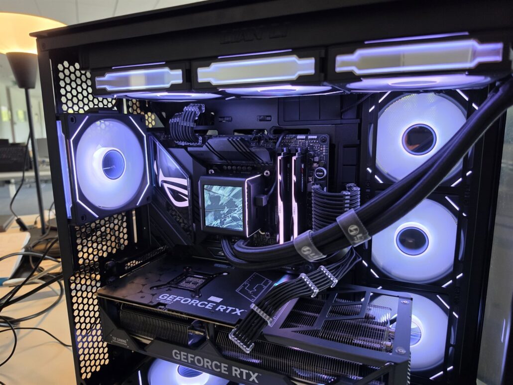 Finished custom PC inside the Lian Li O11 Vision with white lighting: GeForce RTX 4080 SUPER, Galahad II LCD cooler and reverse-blade fans