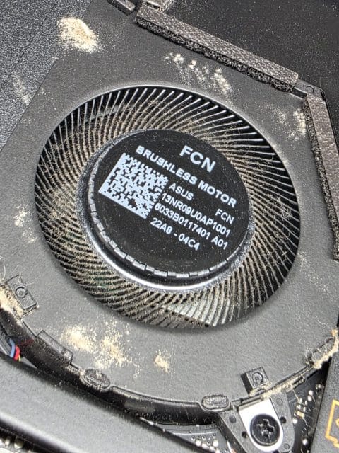 Laptop fan with dust stuck between the blades