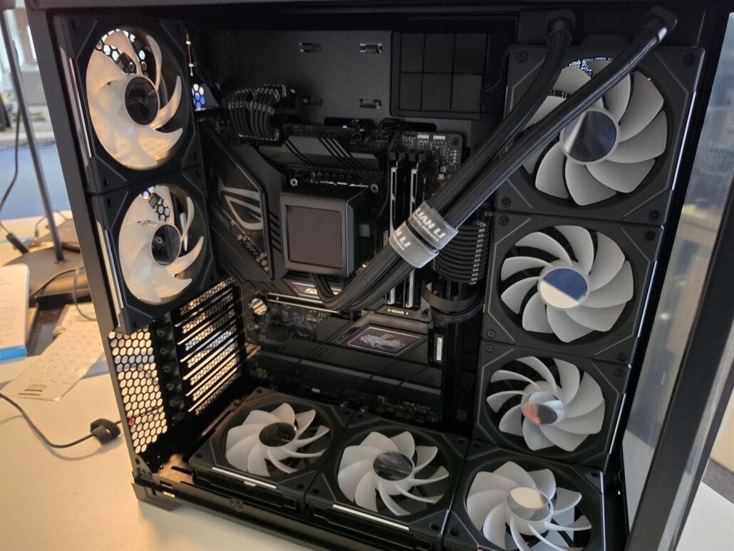 All eleven fans mounted in the Lian Li O11 Vision with the ROG Strix Z790-F motherboard and 360 mm liquid cooler, before the graphics card went in