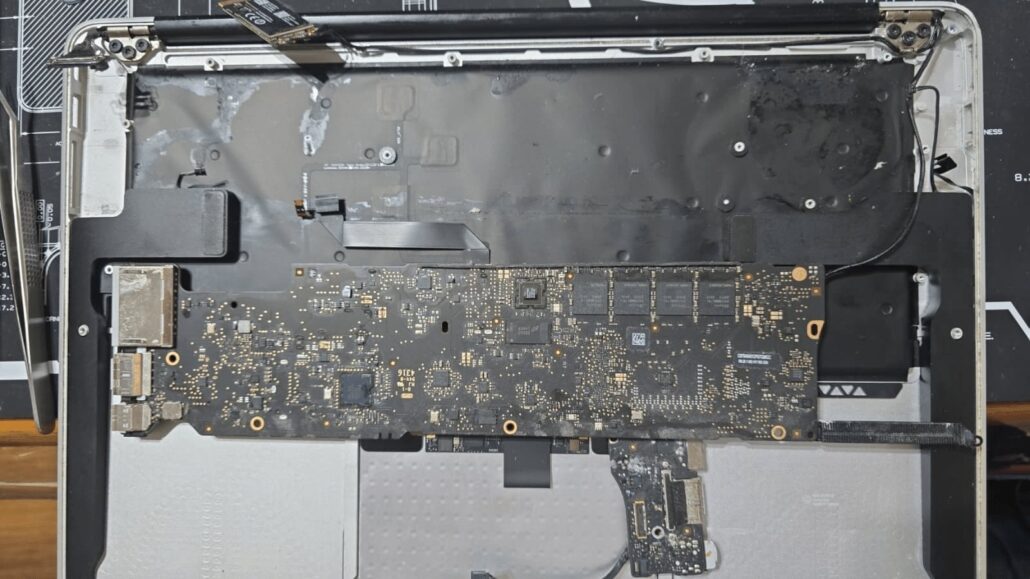 MacBook Pro opened on the bench for liquid spillage cleaning at We Make IT Happen