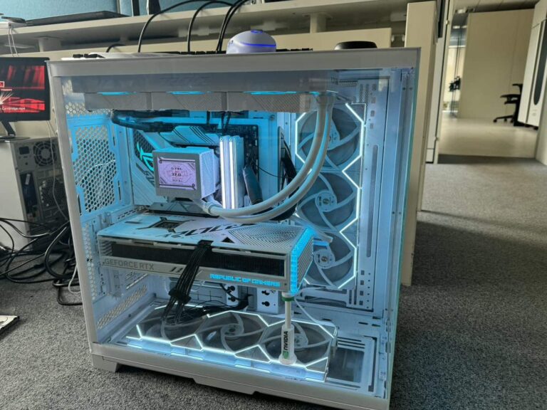 White custom PC with liquid cooling and glass panels