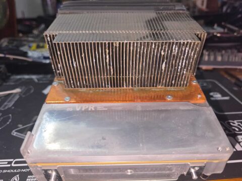 Xbox heatsink and vapor chamber cooling plate with dust build-up between the fins