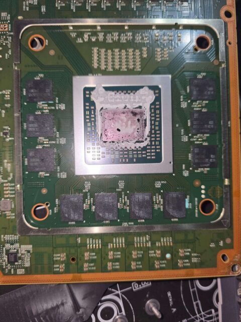 Xbox processor board with the APU and surrounding components after the heatsink was removed