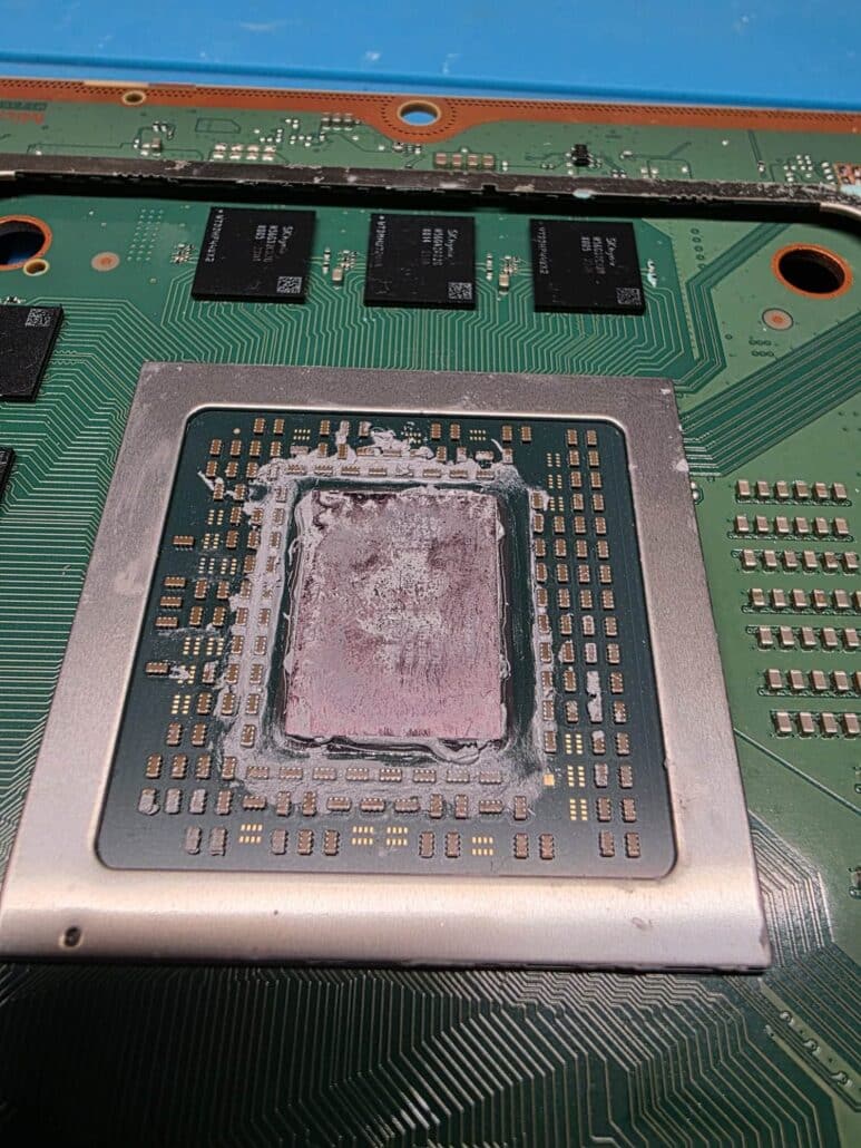 Xbox Series X processor with the original dried thermal paste that the previous repair never replaced